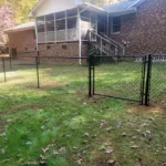 a fence in front of a house