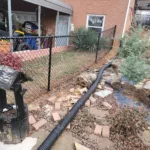 a black pipe in a yard
