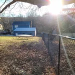 a fence and a house